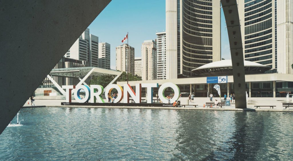 World travelers find themselves in Toronto real estate